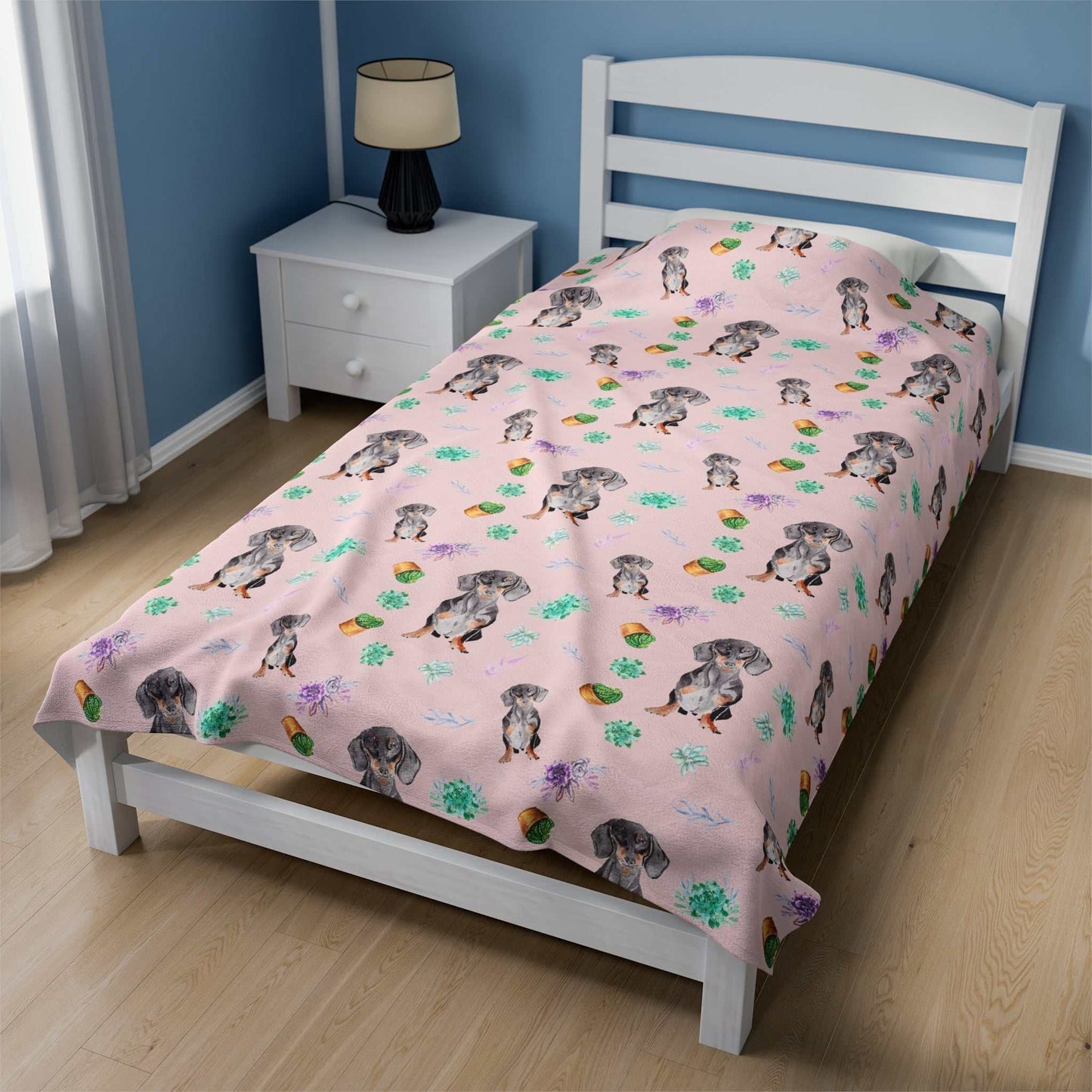 Pink blanket with Dachshunds