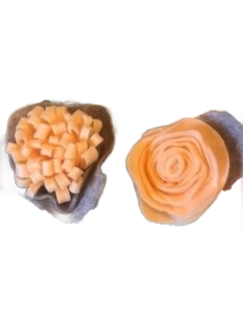 two peach felt flowers