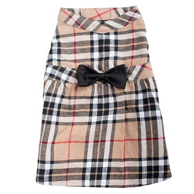 Plaid dog dress with a black bow on a white background