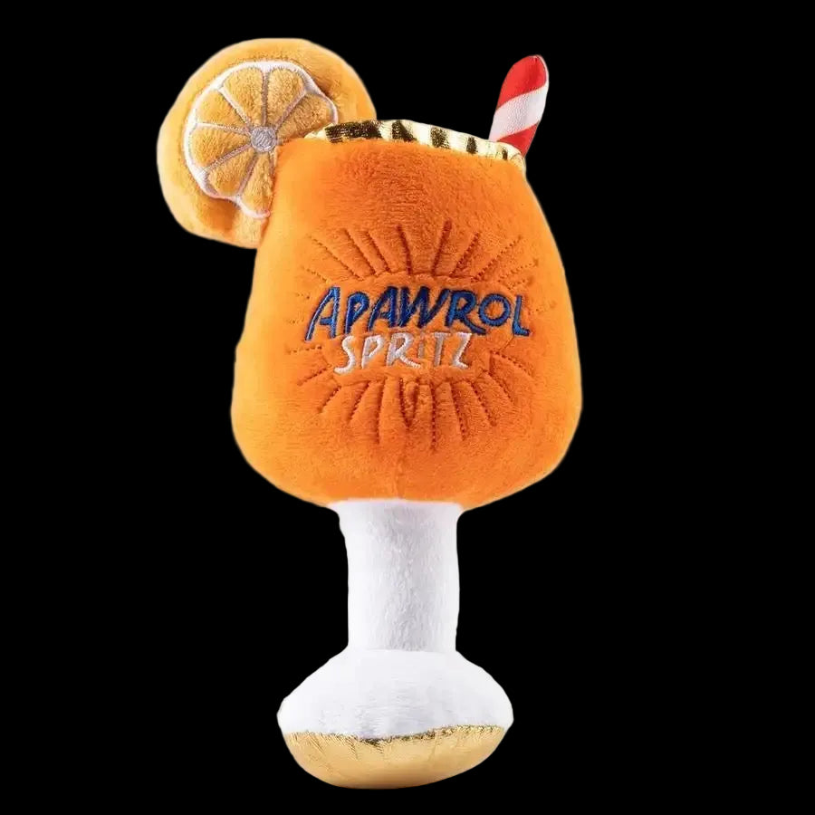 Orange plush toy resembling a cocktail with lemon slice and straw, labeled 'APAWROL SPRITZ' on a white background.