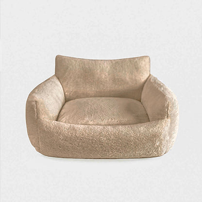 Beige pet bed on a white background