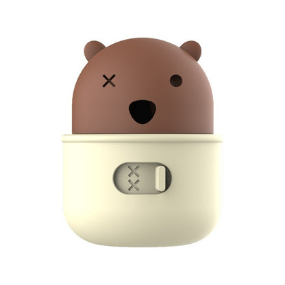 Silicone bear-shaped container with a cream body and brown top on a white background