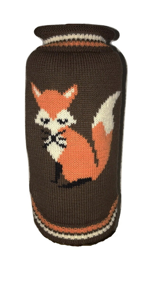 Knitted dog sweater with fox design on a white background