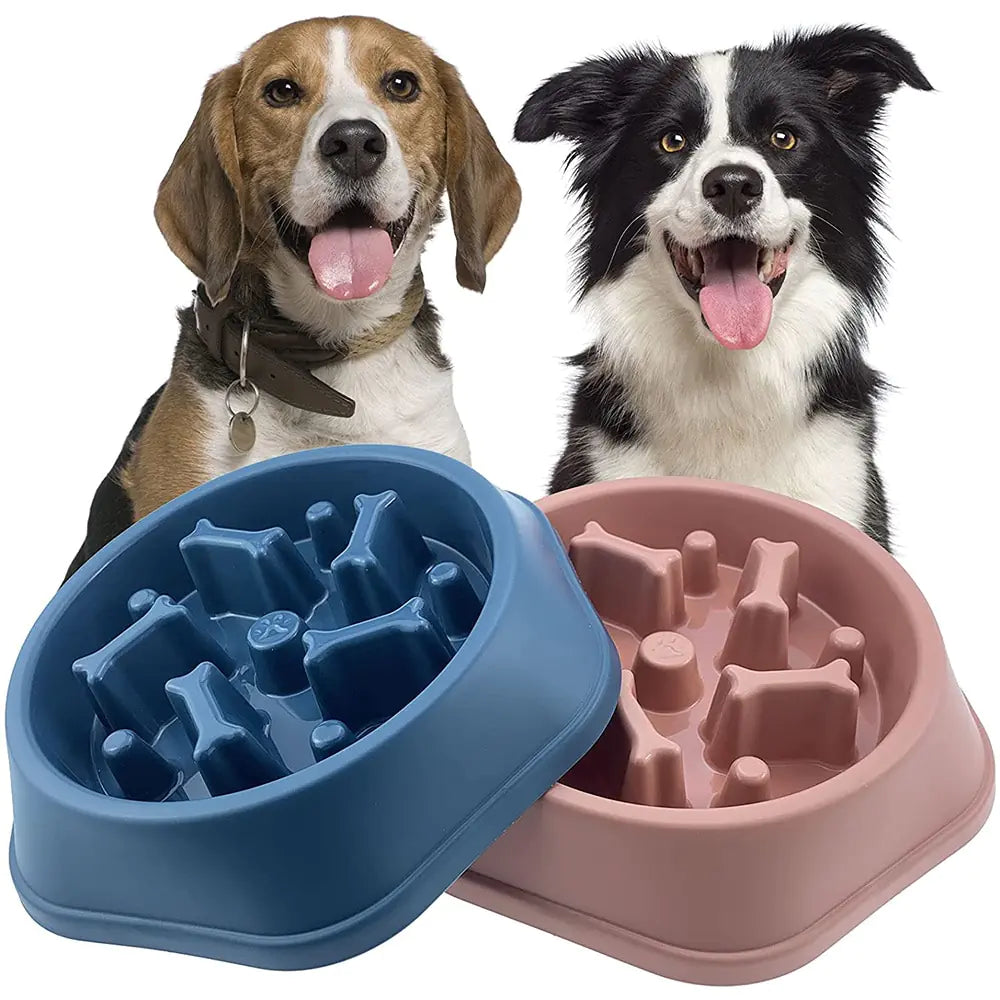 Two slow feeder pet bowls, one blue and one pink, with a bone-shaped design inside.